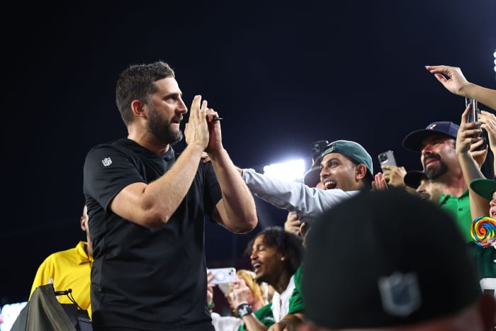 Philadelphia Eagles head coach Nick Sirianni celebrates with the fans.